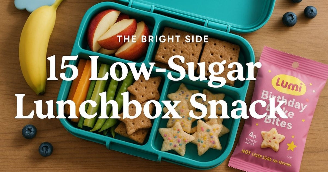 Kids lunchbox with fruit, crackers, veggies, and Lumi Birthday Cake Bites for a low-sugar snack guide.